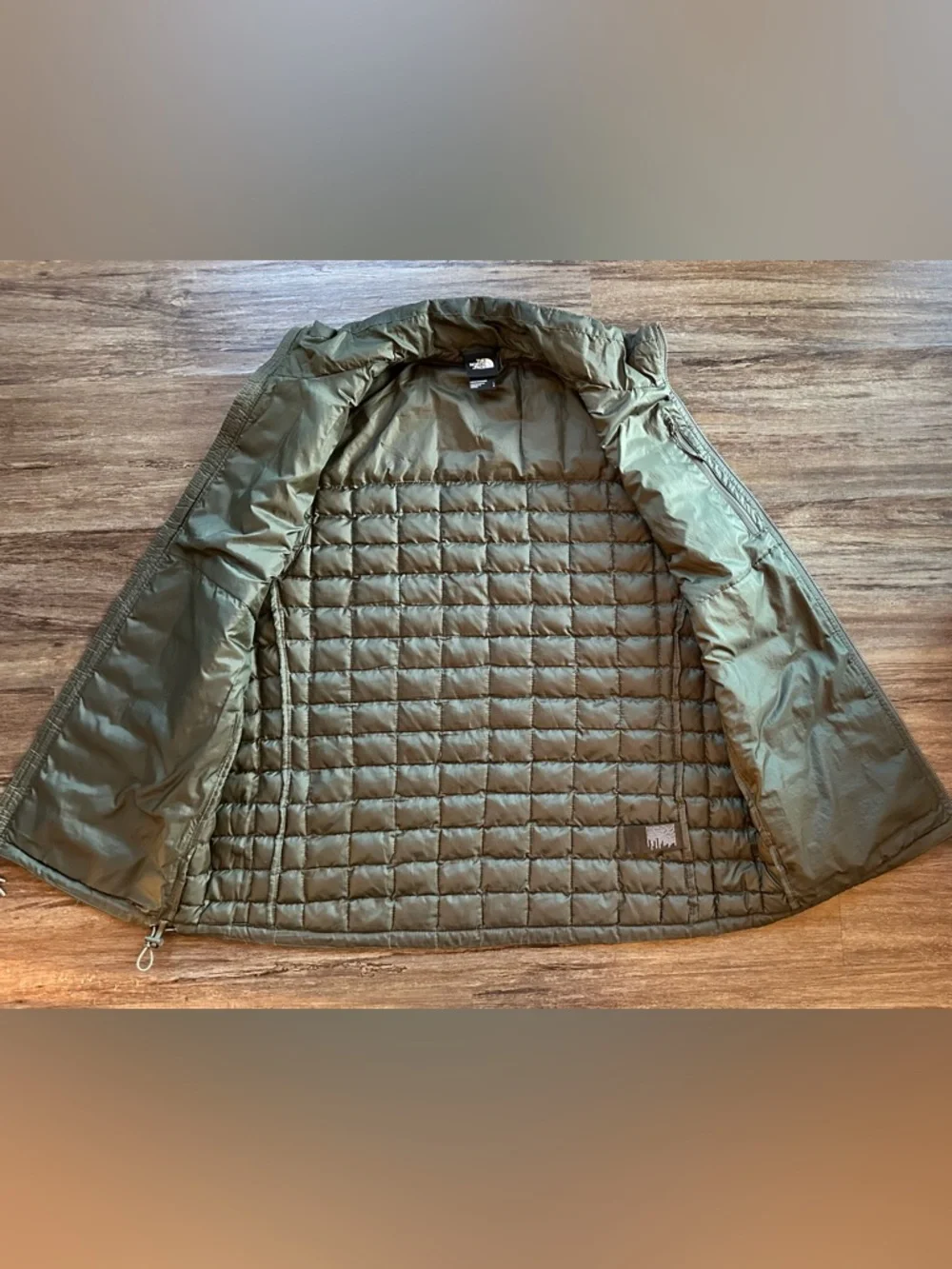 The North Face Men's Thermoball Vest in Woodland Green. Size L. *minor flaw*